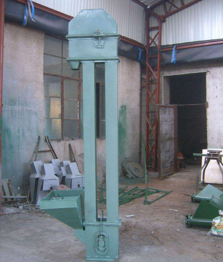 浅谈环链斗式提升机输送带的安装，调试和维护